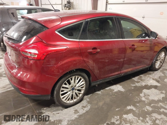 2017 Ford Focus Titanium with VIN 1FADP3N24HL320589, listed as a IAAI auction lot 41618322 with 81,722 mi miles and . Bid and sale history available at carsss.com. Image 4.