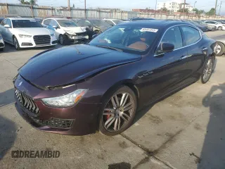 2018 Maserati Ghibli with VIN ZAM57XSA0J1286682, listed as a Copart auction lot 65457315 with 50,169 mi miles and Salvage title. Bid and sale history available at DreamBid. Image 1.