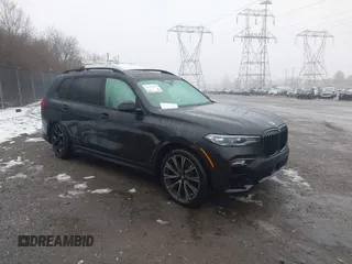 2021 BMW X7 M50i with VIN 5UXCX6C06M9H72206, listed as a IAAI auction lot 41577528 with 32,973 mi miles. Bid and sale history available at carsss.com. Image 1.