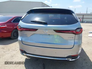 2025 Mazda CX-90 Premium Plus Package z VIN JM3KKEHD1S1228777, wystawiony jako IAAI lot #42218405 z przebiegiem 1 582 mil mil oraz . Historia ofert i sprzedaży dostępna na DreamBid. Obrazek 16.