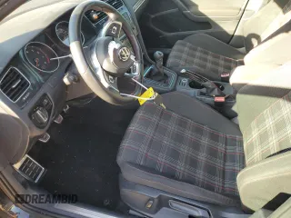 2015 Volkswagen GTI S z VIN 3VW5T7AU5FM100458, wystawiony jako Copart lot #77452564 z przebiegiem Nie podano mil oraz Szkoda całkowita • Salvage title. Historia ofert i sprzedaży dostępna na DreamBid. Obrazek 7.
