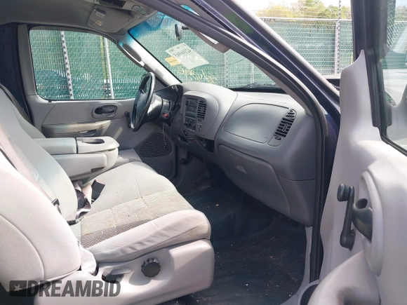 2003 Ford F-150 XL with VIN 1FTRX17223NB22897, listed as a IAAI auction lot 42166965 with 207,627 mi miles and . Bid and sale history available at DreamBid. Image 5.