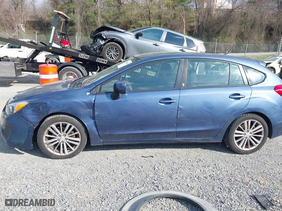 2012 Subaru Impreza Wagon 2.0i Premium with VIN JF1GPAD6XCH212222, listed as a IAAI auction lot 41899489 with 136,410 mi miles. Bid and sale history available at carsss.com. Image 14.