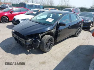 2016 Ford Focus SE with VIN 1FADP3FE6GL335943, listed as a IAAI auction lot 42060995 with 115,701 mi miles. Bid and sale history available at carsss.com. Image 2.