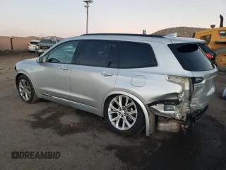 2020 Cadillac XT6 AWD Sport z VIN 1GYKPGRS8LZ216836, wystawiony jako Copart lot #82161014 z przebiegiem 90 883 mil mil oraz Szkody całkowita. Historia ofert i sprzedaży dostępna na DreamBid. Obrazek 2.