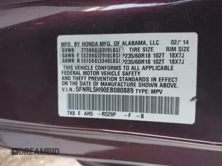 2014 Honda Odyssey Touring with VIN 5FNRL5H90EB080889, listed as a IAAI auction lot 42085305 with 123,286 mi miles and . Bid and sale history available at carsss.com. Image 9.