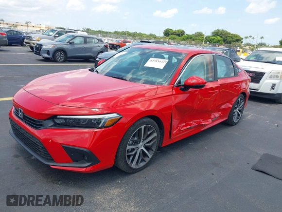 2023 Honda Civic Touring with VIN 2HGFE1F94PH323451, listed as a IAAI auction lot 42383422 with 6,120 mi miles and . Bid and sale history available at DreamBid. Image 2.