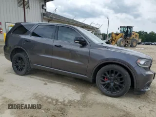 2015 Dodge Durango Limited with VIN 1C4RDJDG0FC904897, listed as a Copart auction lot 58985025 with 147,139 mi miles and Salvage title. Bid and sale history available at DreamBid. Image 4.