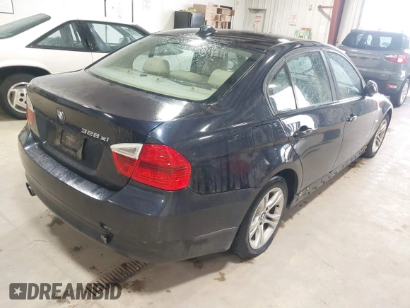 2008 BMW 3 Series 328xi with VIN WBAVC93518K037807, listed as a IAAI auction lot 42203483 with 161,491 mi miles and . Bid and sale history available at carsss.com. Image 4.