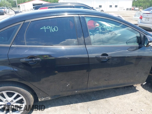 2016 Ford Focus SE with VIN 1FADP3F29GL256160, listed as a IAAI auction lot 42188124 with 72,868 mi miles and . Bid and sale history available at DreamBid. Image 14.