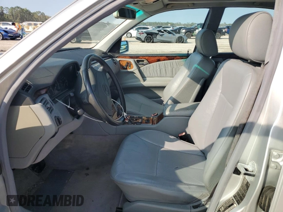 1999 Mercedes-Benz E-Class with VIN WDBJF65H9XA903481, listed as a Copart auction lot 79516914 with 201,080 mi miles and Salvage Title. Bid and sale history available at carsss.com. Image 7.