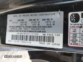 2014 Mazda 3 i Grand Touring z VIN JM1BM1M75E1151329, wystawiony jako IAAI lot #42248334 z przebiegiem 138 748 mil mil oraz . Historia ofert i sprzedaży dostępna na DreamBid. Obrazek 9.