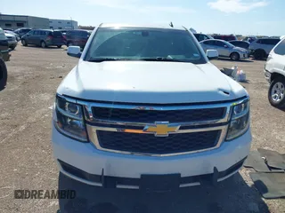 2015 Chevrolet Tahoe Commercial z VIN 1GNLC2EC8FR255526, wystawiony jako IAAI lot #42538320 z przebiegiem 165 502 mil mil oraz . Historia ofert i sprzedaży dostępna na DreamBid. Obrazek 12.