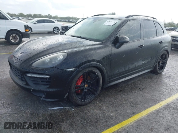 2014 Porsche Cayenne GTS with VIN WP1AD2A28ELA74131, listed as a IAAI auction lot 42829362 with Not provided miles and . Bid and sale history available at DreamBid. Image 2.
