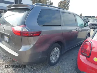 2015 Toyota Sienna XLE with VIN 5TDYK3DC6FS660410, listed as a IAAI auction lot 41801496 with 81,755 mi miles. Bid and sale history available at carsss.com. Image 4.
