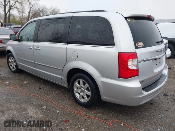 2012 Chrysler Town & Country Touring with VIN 2C4RC1BGXCR213014, listed as a IAAI auction lot 41997723 with 143,848 mi miles. Bid and sale history available at carsss.com. Image 3.