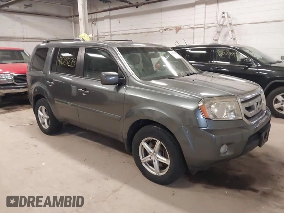2011 Honda Pilot EX-L with VIN 5FNYF4H55BB039079, listed as a IAAI auction lot 42029278 with 173,216 mi miles. Bid and sale history available at carsss.com. Image 1.