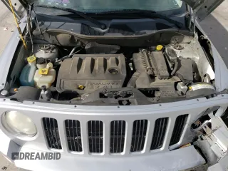 2010 Jeep Patriot Sport z VIN 1J4NT2GB4AD523378, wystawiony jako Copart lot #57088185 z przebiegiem 119 937 mil mil oraz Szkoda całkowita • Salvage title. Historia ofert i sprzedaży dostępna na DreamBid. Obrazek 12.