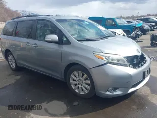 2015 Toyota Sienna XLE with VIN 5TDYK3DC2FS640204, listed as a IAAI auction lot 41772349 with 104,156 mi miles. Bid and sale history available at carsss.com. Image 1.