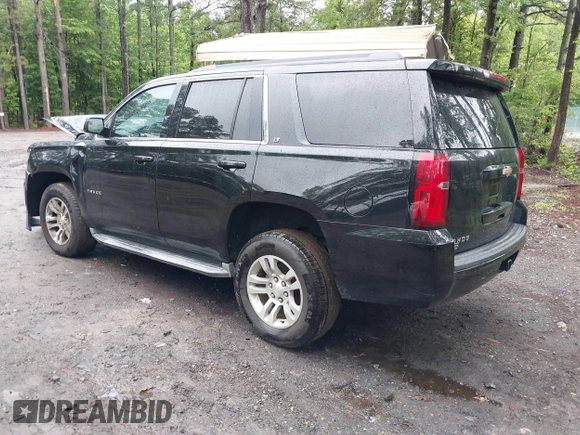 2015 Chevrolet Tahoe LT with VIN 1GNSCBKC9FR600997, listed as a IAAI auction lot 42383789 with 161,151 mi miles and . Bid and sale history available at DreamBid. Image 3.