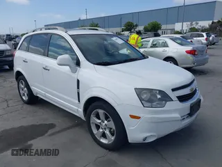 2015 Chevrolet Captiva Sport LTZ z VIN 3GNAL4EK6FS526381, wystawiony jako IAAI lot #42488555 z przebiegiem Nie podano mil oraz . Historia ofert i sprzedaży dostępna na DreamBid. Obrazek 1.