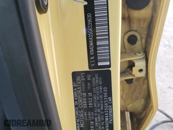 2016 Kia Rio LX with VIN KNADM4A35G6539630, listed as a Copart auction lot 65754674 with 87,478 mi miles and Salvage Title. Bid and sale history available at DreamBid. Image 14.