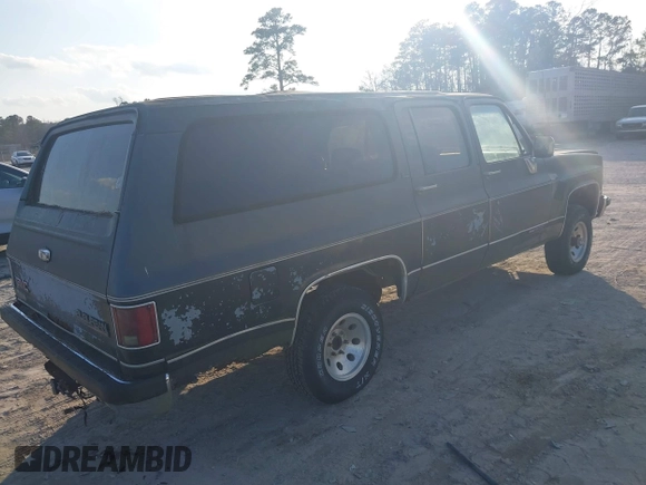 1989 GMC Suburban z VIN 1GKEV16KXKF536870, wystawiony jako IAAI lot #41531645 z przebiegiem 13 976 mil mil oraz . Historia ofert i sprzedaży dostępna na DreamBid. Obrazek 4.
