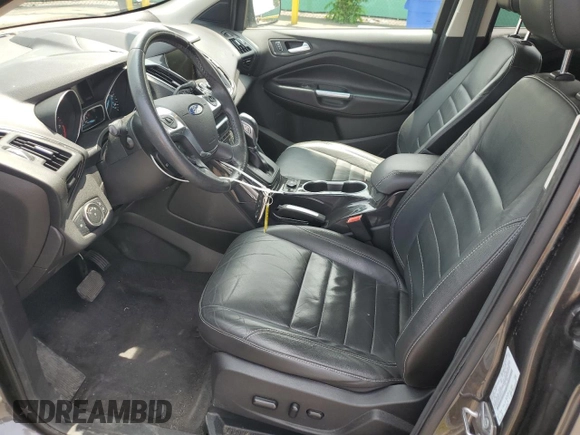2015 Ford Escape Titanium with VIN 1FMCU9J98FUB49112, listed as a Copart auction lot 58989915 with 94,060 mi miles and Salvage title. Bid and sale history available at DreamBid. Image 7.
