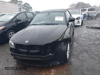 2011 BMW 1 Series 128i with VIN WBAUL7C52BVM79176, listed as a IAAI auction lot 41387249 with 99,145 mi miles and . Bid and sale history available at carsss.com. Image 13.