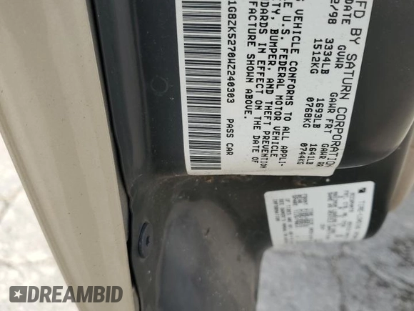 1998 Saturn SL with VIN 1G8ZK5270WZ240303, listed as a Copart auction lot 65364164 with 156,699 mi miles and Salvage title. Bid and sale history available at DreamBid. Image 12.