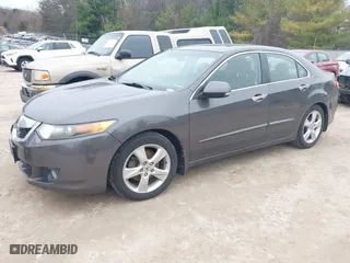 2009 Acura TSX with VIN JH4CU26629C033049, listed as a IAAI auction lot 41969918 with 122,772 mi miles. Bid and sale history available at carsss.com. Image 2.
