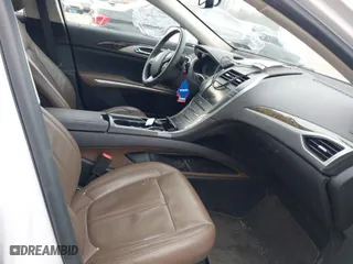 2014 Lincoln MKZ with VIN 3LN6L2J94ER832938, listed as a IAAI auction lot 41919093 with 82,313 mi miles. Bid and sale history available at carsss.com. Image 5.
