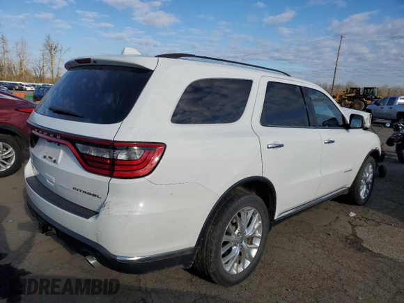 2014 Dodge Durango Citadel with VIN 1C4SDJET9EC303953, listed as a Copart auction lot 42449905 with 149,089 mi miles and Salvage Title. Bid and sale history available at DreamBid. Image 3.