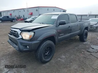 2015 Toyota Tacoma with VIN 3TMMU4FN0FM085444, listed as a IAAI auction lot 41388229 with 139,802 mi miles and . Bid and sale history available at DreamBid. Image 18.