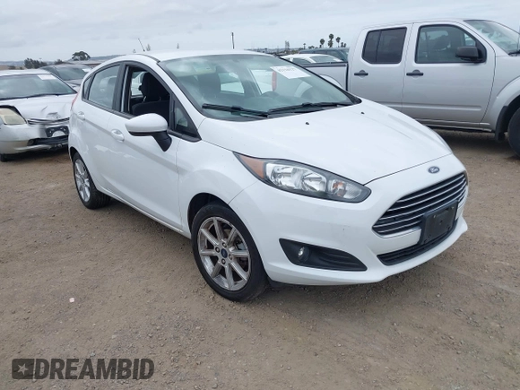 2019 Ford Fiesta SE with VIN 3FADP4EJXKM143274, listed as a IAAI auction lot 42124127 with 85,525 mi miles. Bid and sale history available at carsss.com. Image 1.