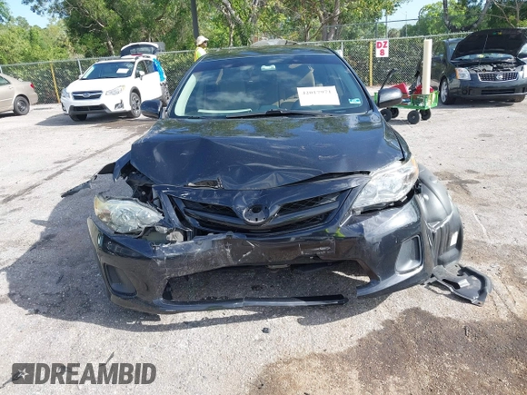 2012 Toyota Corolla L with VIN 2T1BU4EE9CC915917, listed as a IAAI auction lot 42017971 with 86,524 mi miles. Bid and sale history available at carsss.com. Image 12.