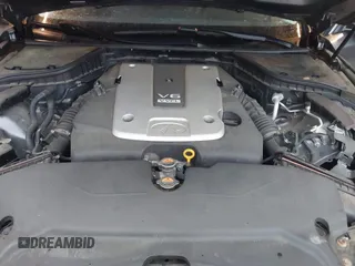 2014 Infiniti Q50 Premium z VIN JN1BV7AR7EM696486, wystawiony jako IAAI lot #41976047 z przebiegiem 145 000 mil mil oraz . Historia ofert i sprzedaży dostępna na DreamBid. Obrazek 9.