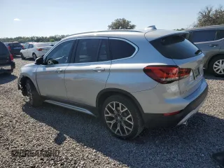 2021 BMW X1 sDrive28i z VIN WBXJG7C06M5U15436, wystawiony jako Copart lot #52382635 z przebiegiem 57 917 mil mil oraz Szkody całkowita. Historia ofert i sprzedaży dostępna na DreamBid. Obrazek 2.