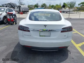 2013 Tesla Model S with VIN 5YJSA1CN2DFP17316, listed as a IAAI auction lot 42092751 with 1 mi miles. Bid and sale history available at carsss.com. Image 16.