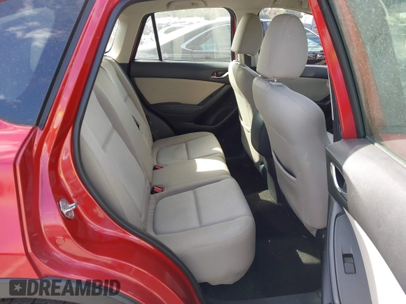 2016 Mazda CX-5 Sport with VIN JM3KE2BY4G0701442, listed as a IAAI auction lot 41682335 with 125,624 mi miles. Bid and sale history available at carsss.com. Image 8.