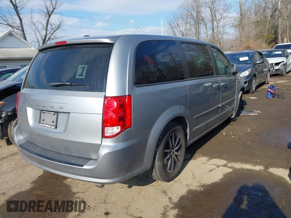 2016 Dodge Grand Caravan SE with VIN 2C4RDGBG7GR252195, listed as a IAAI auction lot 41415977 with 199,453 mi miles and . Bid and sale history available at DreamBid. Image 4.