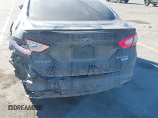 2014 Ford Fusion Titanium with VIN 3FA6P0K93ER293357, listed as a IAAI auction lot 41354955 with 176,130 mi miles. Bid and sale history available at carsss.com. Image 6.