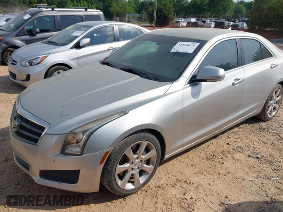 2013 Cadillac ATS Luxury z VIN 1G6AB5RA2D0117112, wystawiony jako IAAI lot #42288670 z przebiegiem 131 515 mil mil oraz . Historia ofert i sprzedaży dostępna na DreamBid. Obrazek 2.