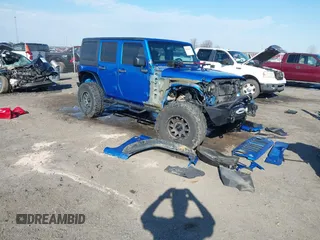 2016 Jeep Wrangler Unlimited Sahara with VIN 1C4BJWEG1GL143126, listed as a IAAI auction lot 41614428 with 137,844 mi miles and . Bid and sale history available at DreamBid. Image 1.