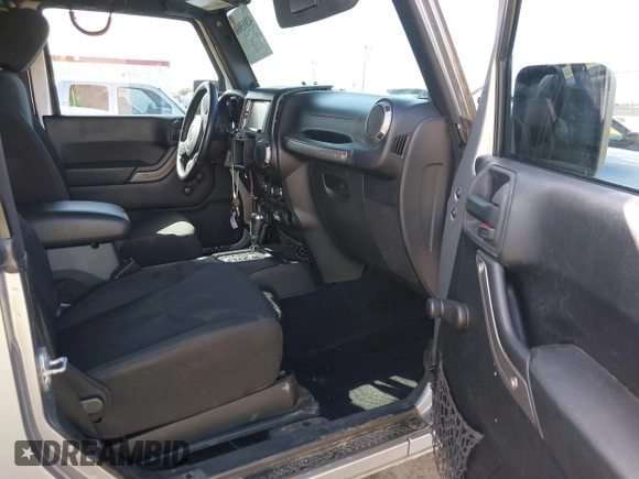 2014 Jeep Wrangler Sport with VIN 1C4AJWAG5EL206565, listed as a IAAI auction lot 42015000 with 90,129 mi miles and . Bid and sale history available at carsss.com. Image 5.