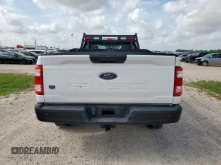 2022 Ford F-150 XL with VIN 1FTMF1C56NKD24644, listed as a Copart auction lot 63307315 with 64,704 mi miles and Salvage title. Bid and sale history available at DreamBid. Image 6.