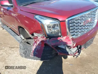 2018 GMC Yukon XL Denali with VIN 1GKS2HKJ3JR372473, listed as a IAAI auction lot 41637623 with 130,295 mi miles and . Bid and sale history available at DreamBid. Image 6.