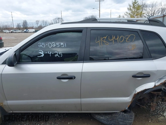 2006 Hyundai Tucson GL with VIN KM8JM12B56U480904, listed as a IAAI auction lot 41844087 with 216,322 mi miles. Bid and sale history available at carsss.com. Image 13.