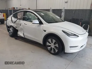 2020 Tesla Model Y Long Range z VIN 5YJYGDEE8LF054338, wystawiony jako IAAI lot #39026888 z przebiegiem 86 142 mil mil oraz . Historia ofert i sprzedaży dostępna na DreamBid. Obrazek 1.