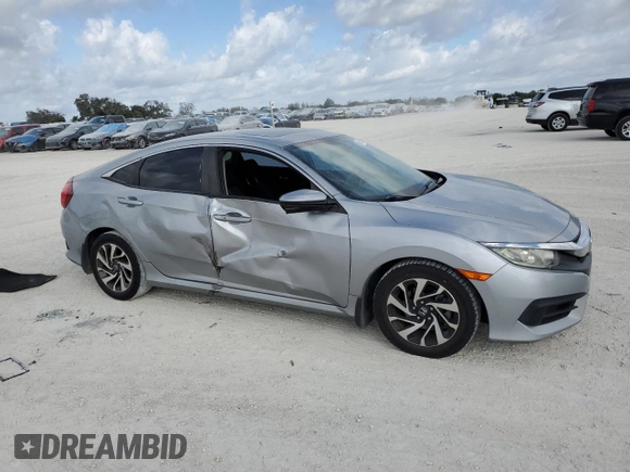 2016 Honda Civic EX with VIN 19XFC2F74GE059765, listed as a Copart auction lot 45555735 with 48,643 mi miles and Salvage Title. Bid and sale history available at DreamBid. Image 4.